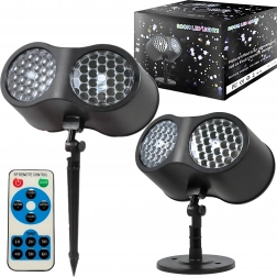 Kerst LED laserprojector met sneeuwvlokken voor op het huis