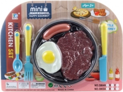 Set van plastic etenswaren met bestek en bordje