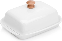 Witte keramische botervloot met houten handgreep