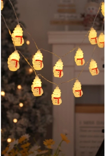 Warm licht met sneeuwpoppen