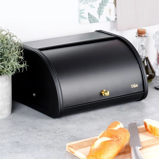 Comfortabel roldecksel met gouden knop