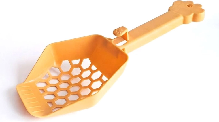 Schepje voor kattenbakvulling met handvat in de vorm van een pootje