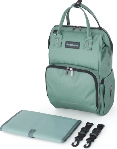 Handen vrij dankzij bevestiging aan kinderwagen en kofferband