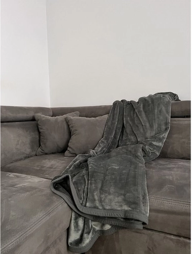 Elegante decoratie en praktische sprei