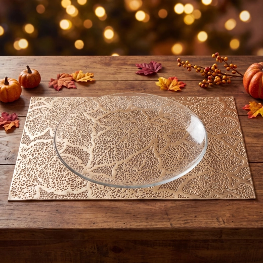 Gouden PVC-tafelmat met bladmotief 45 × 30 cm