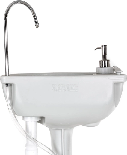 Geïntegreerde zeepdispenser en praktisch accessoire