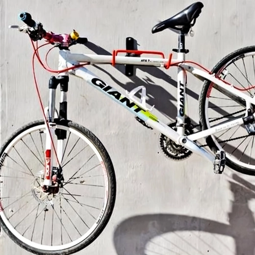 Veilige opslag van de fiets aan de muur