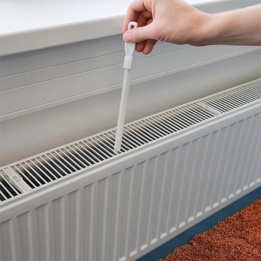 Bereikt tussen de lamellen van radiatoren