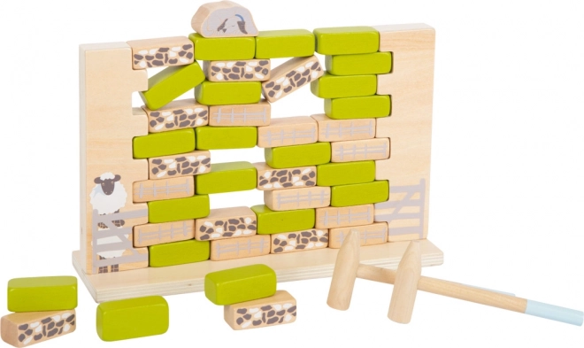 Houten spel wankele muur
