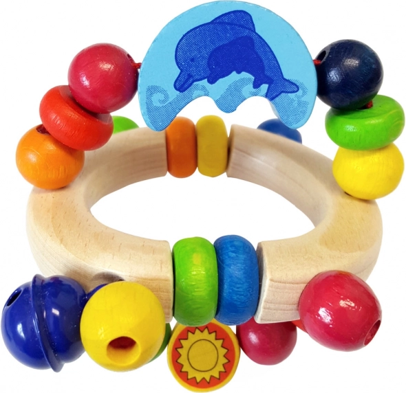 Houten rammelaar met dolfijn