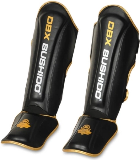 Scheen- en wreefbeschermers DBX BUSHIDO, zwart‑goud