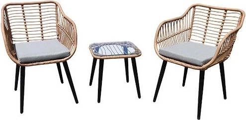 Rotan balkonset met twee fauteuils en een tafeltje met glazen blad