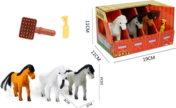 Drie pony’s in de stal met accessoires