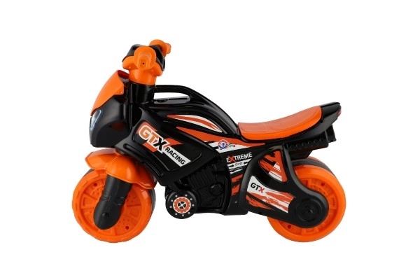 Loopmotor oranje-zwart plastic in zak 35x53x74cm 24m+