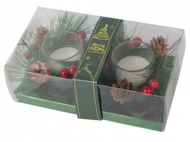 Decoratieve kerstkaarsen in glazen krans