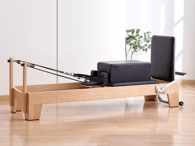 Fitness apparaat voor Pilates Reformer oefeningen