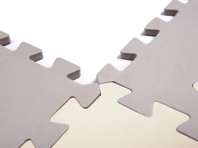 Contrasterende beige schuimpuzzels met diertjes