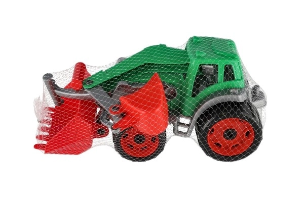 Tractor met lepel en graafmachine