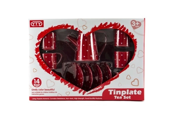 Rood metalen theeservies met hartjes
