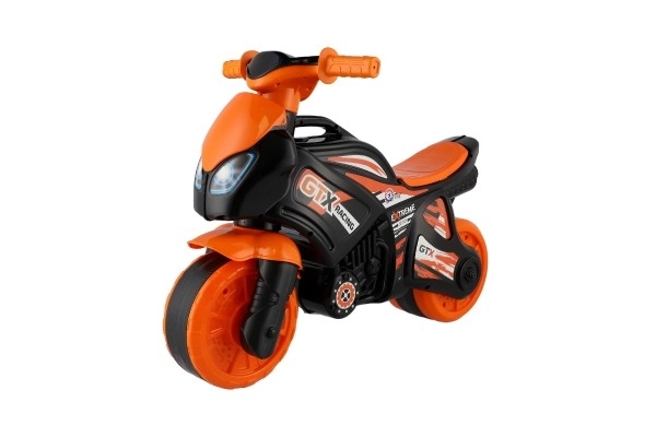 Loopmotor oranje-zwart plastic in zak 35x53x74cm 24m+