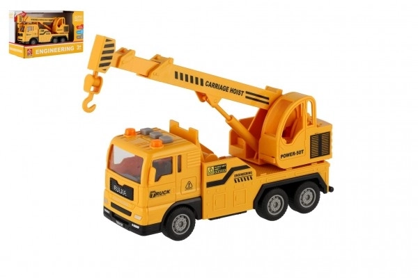 Auto kraan kunststof 16cm op frictie met batterijen met licht en geluid in doos 21x13x9cm