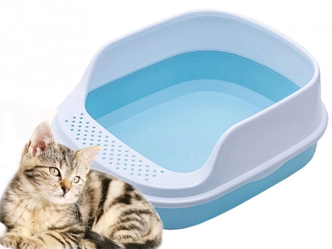 Open kattenbak met rand en schep