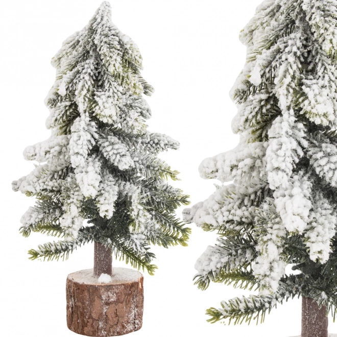 Kleine kunstkerstboom met sneeuweffect
