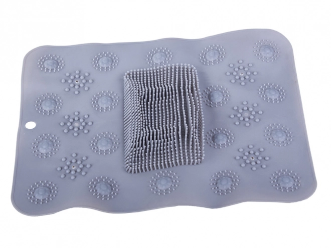 Antislip mat voor voetmassage in de douche