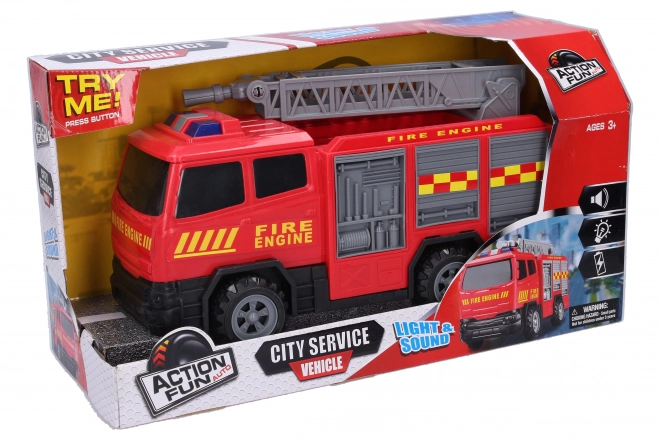 Brandweerwagen met vliegwielaandrijving en effecten 30 cm