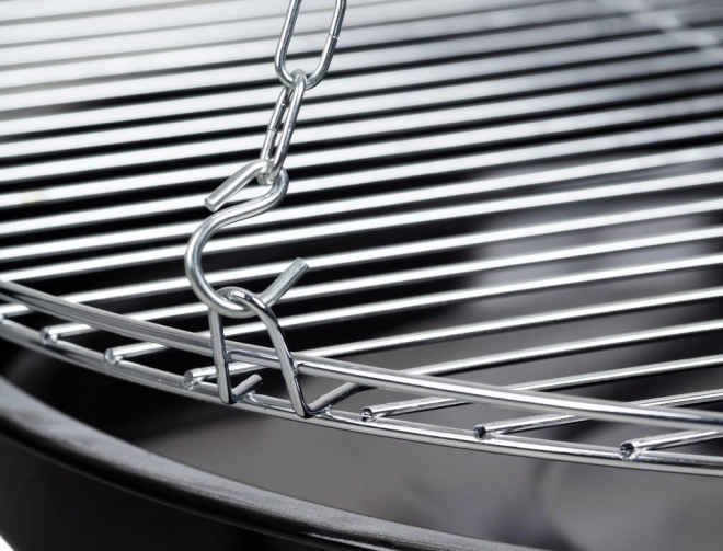Tuinbarbecue Tuinhaard barbecue met rooster op driepoot