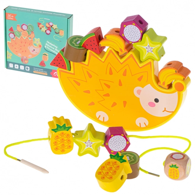 Houten rijgspel met egel en fruit