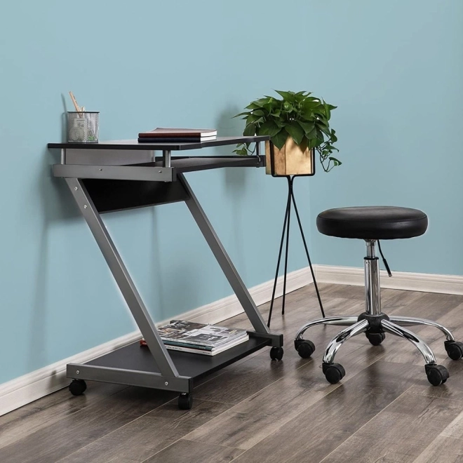 Compact modern computerbureau met uitschuifbaar blad en wieltjes