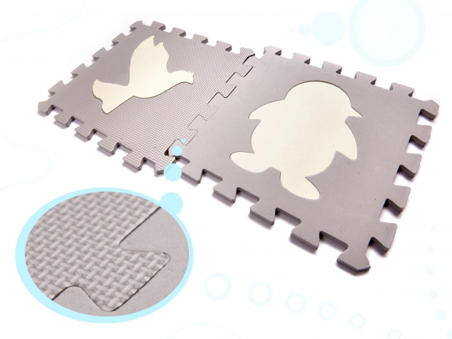 Contrasterende beige schuimpuzzels met diertjes