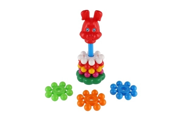 Stapelbare piramide met ringen van plastic 26cm in net 12m+