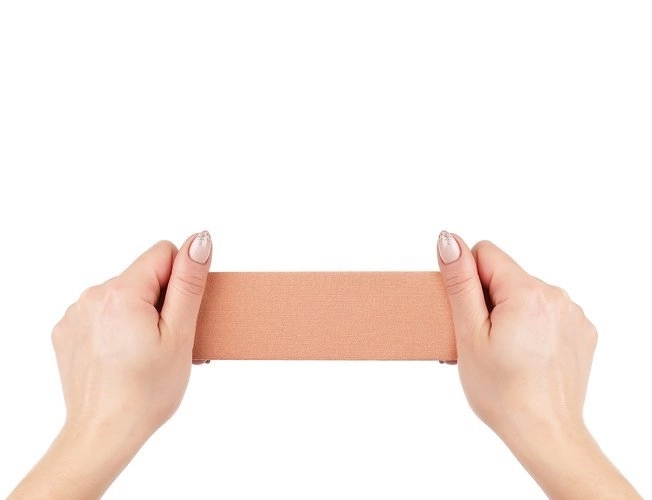 Universele modellentape voor het verstevigen van het decolleté