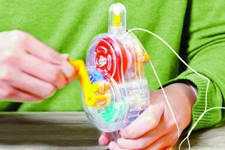 Transparante lamp met gekleurde tandwielen