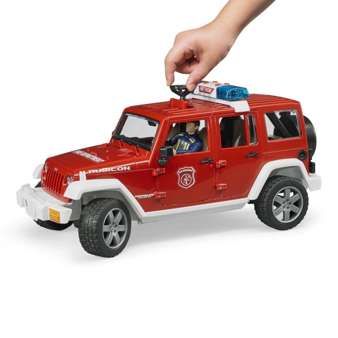 Bruder Rode Brandweer JEEP WRANGLER met figuur en accessoires
