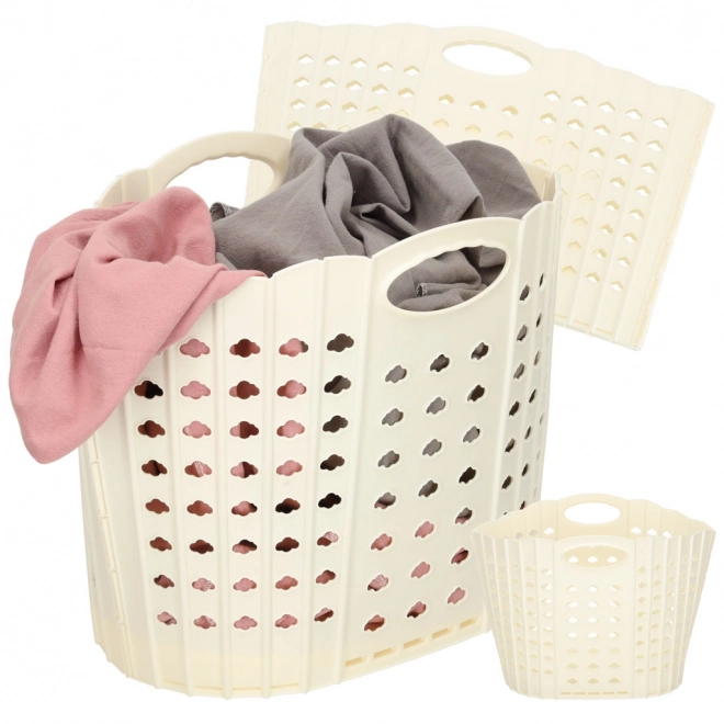 Opvouwbare crèmekleurige wasmand