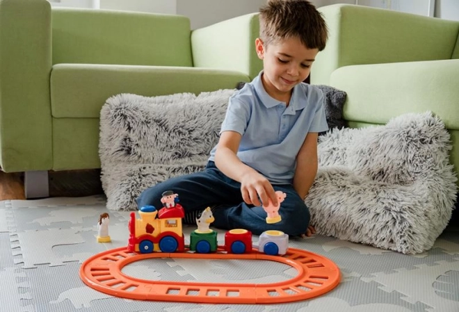 Kindertreintje met melodie en bewegende figuren