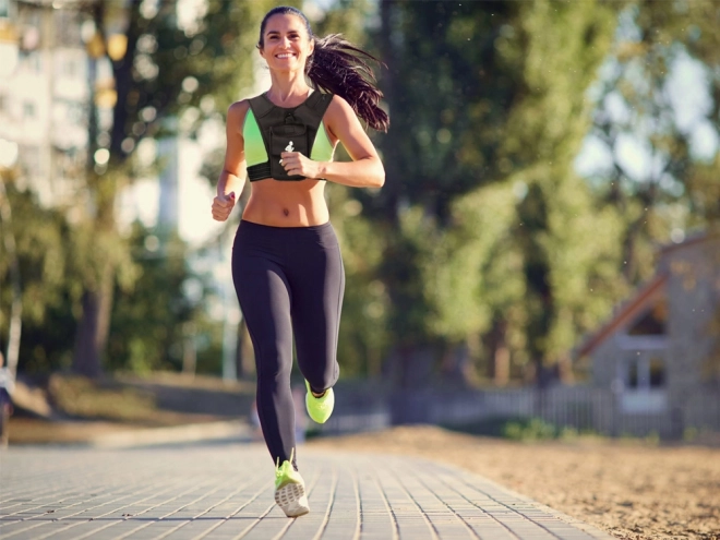 Sportieve hardloopvest met reflecterende elementen en telefoonhouder