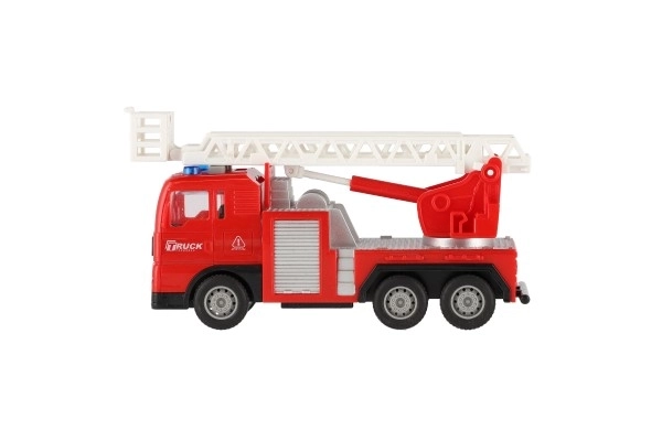 Auto brandweer plastic 16cm met aandrijving op batterijen met licht en geluid in doos 21x13x9cm