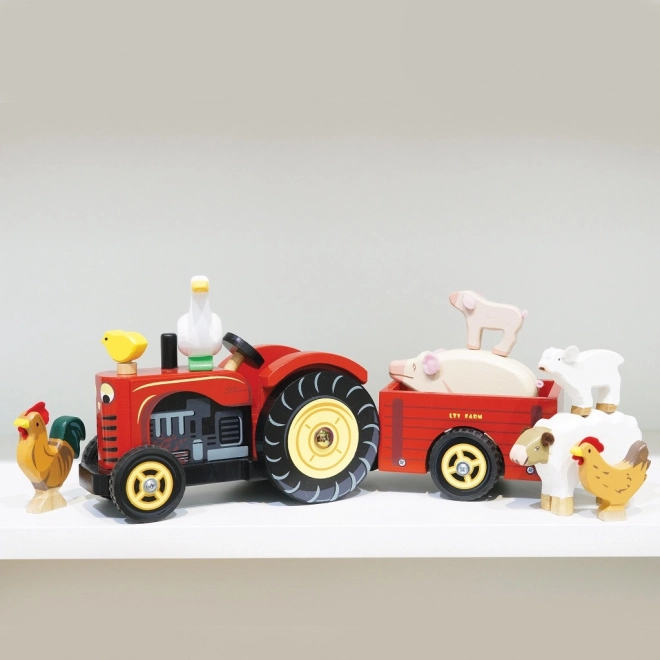 Le Toy Van rode tractor en aanhanger
