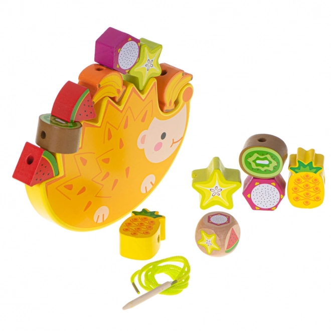 Houten rijgspel met egel en fruit