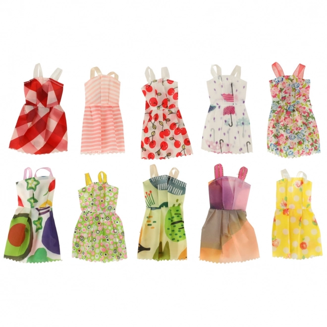 Kleding en accessoires voor poppen - 85 stuks