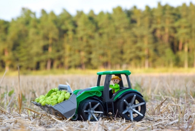 Auto Truxx 2 tractor met liggende plastic 32cm met figuur 24m+