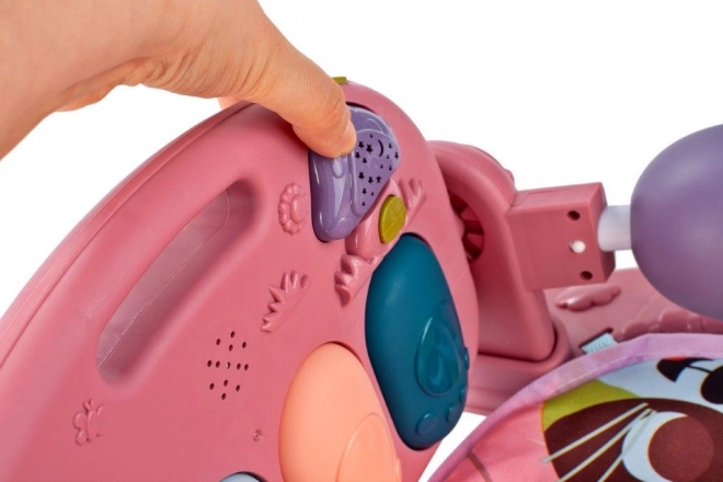 Roze educatieve speelkleed met piano en rammelaars