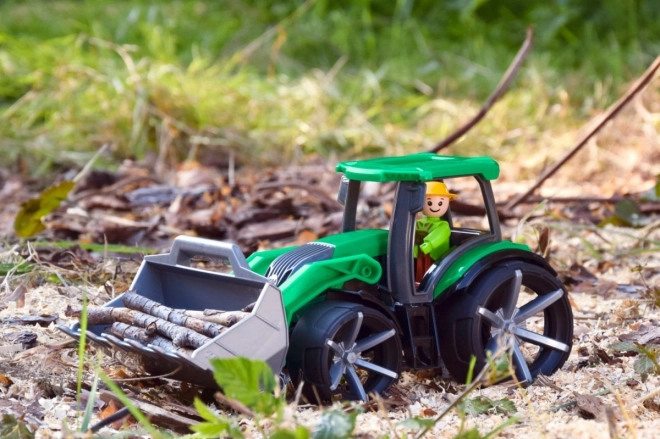 Auto Truxx 2 tractor met liggende plastic 32cm met figuur 24m+