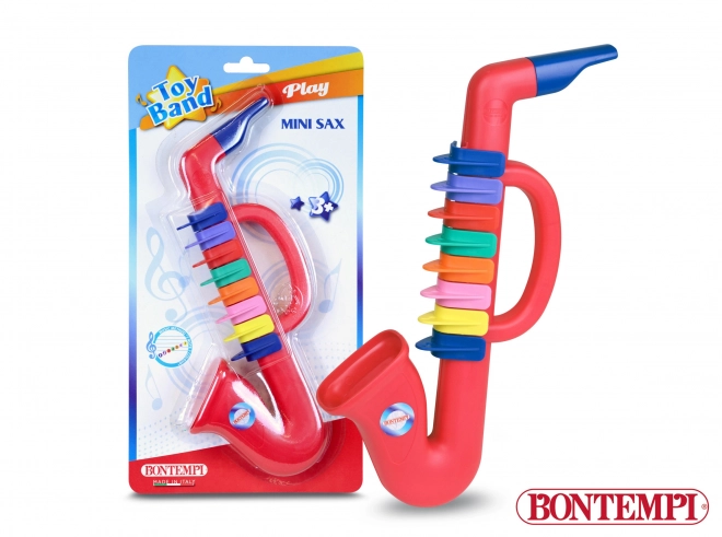Kindere saxofoon van rood plastic met 8 kleppen