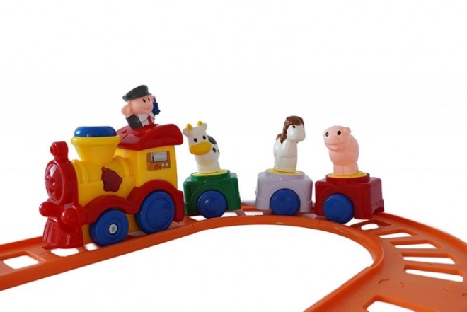 Kindertreintje met melodie en bewegende figuren