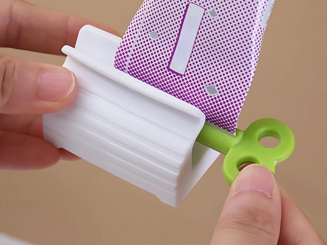 Tube-uitknijper voor crèmes en tandpasta